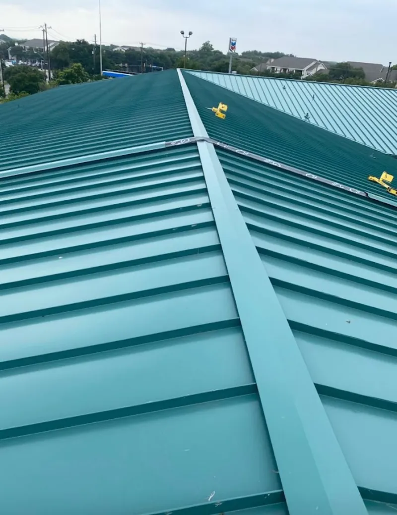 Green commercial metal roof ridge and valley for Metal Roof Repair in Clarence