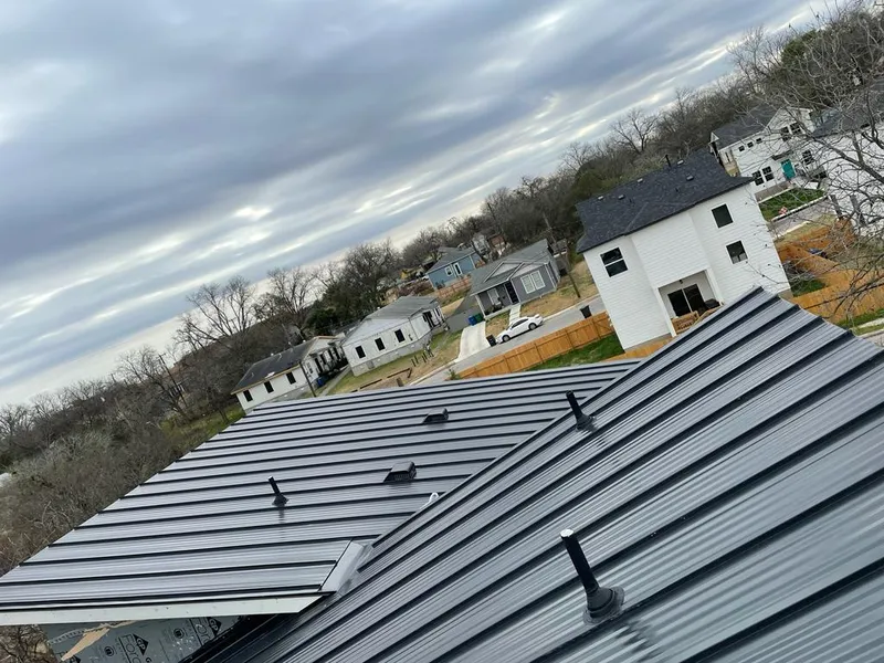 Standing seam metal roof panels with vents for Skylight Repair in Clarence